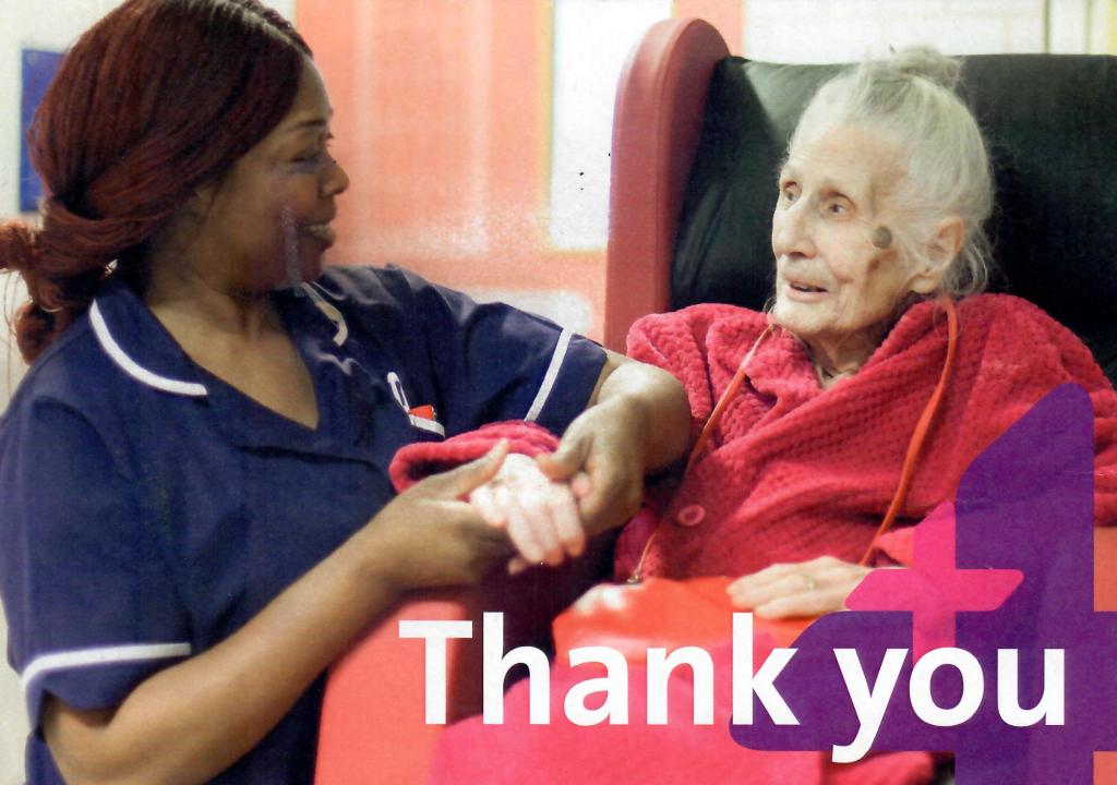 Image of elderly patient with nurse on a card with the word 'Thank you'